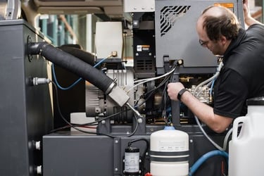 Person working on electronics.