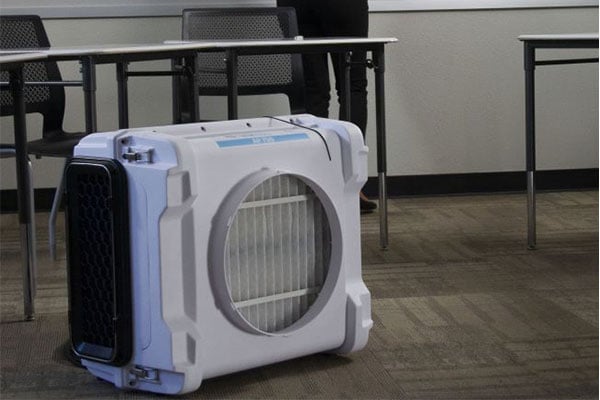 Dri-eaz HEPA air filter in a room 