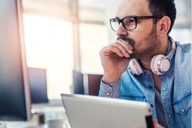 Man sitting at laptop