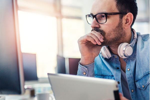 Man sitting at laptop