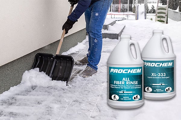 Person schoveling snow and two bottles of Prochem All Fiber Rinse on the side. 