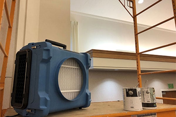 Dir-Eaz air filter in room that is being painted. 